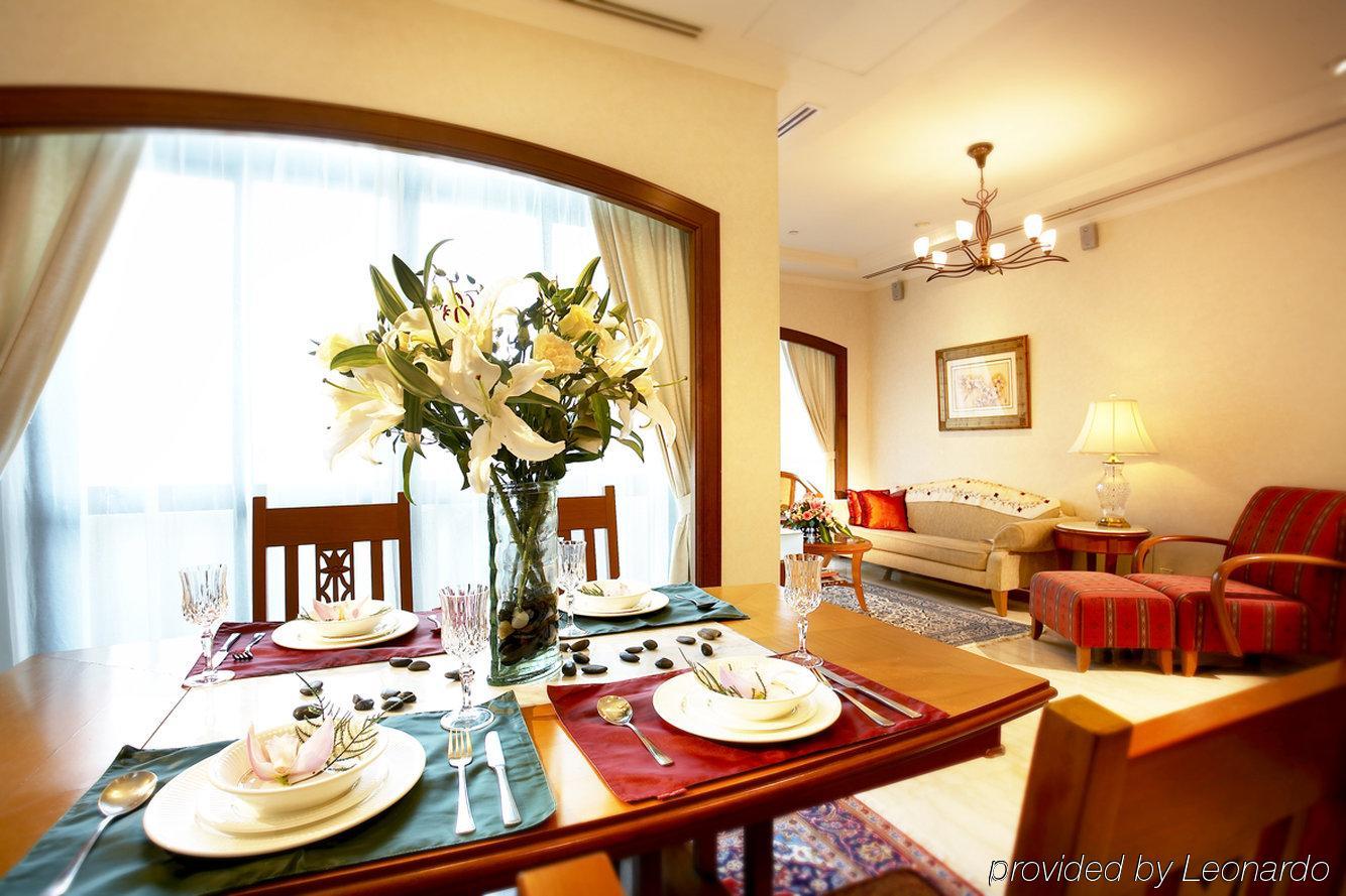 Fraser Suites Singapur Restaurante foto